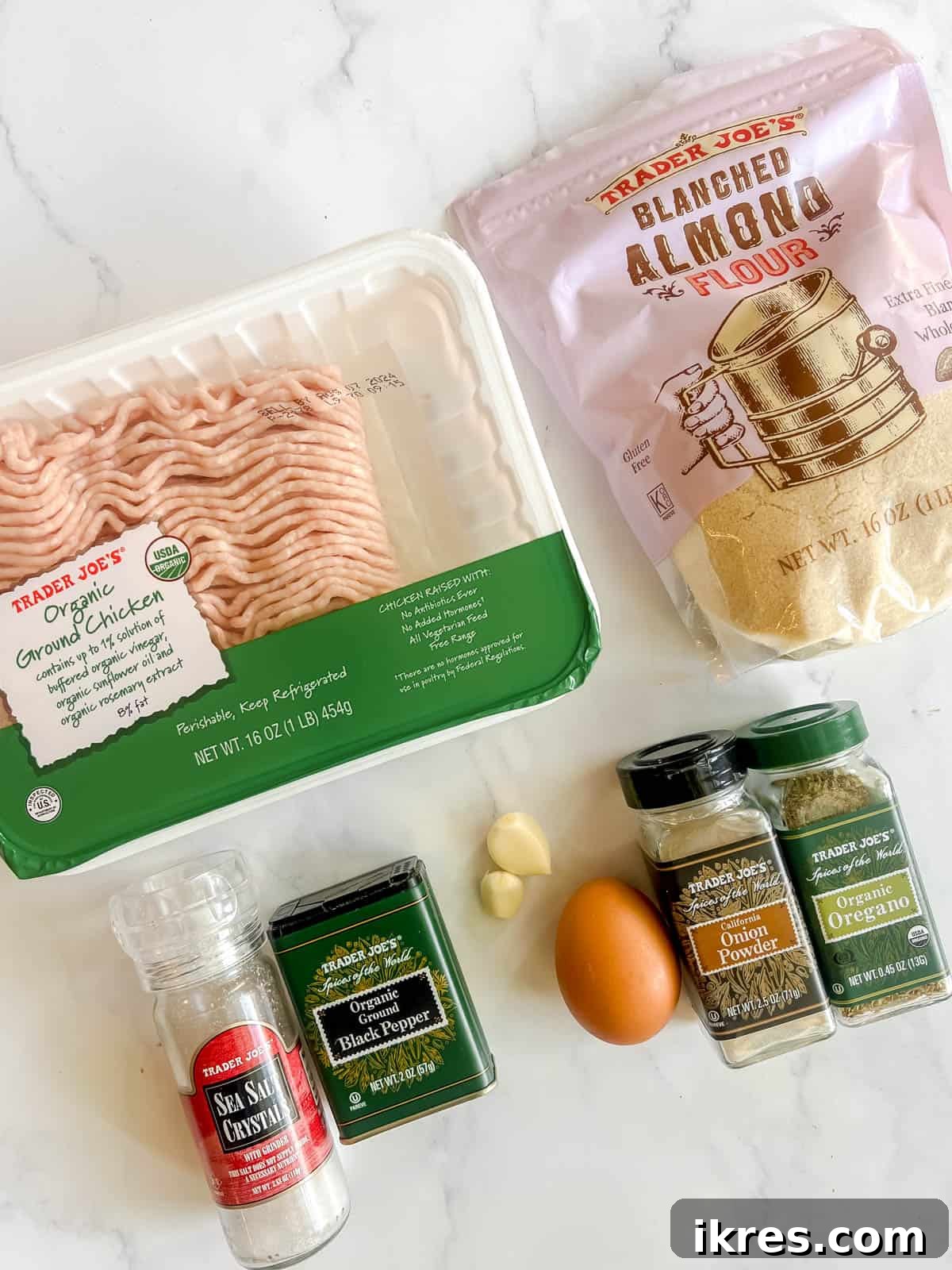 All ingredients for the healthy chicken burger recipe laid out on a kitchen counter.