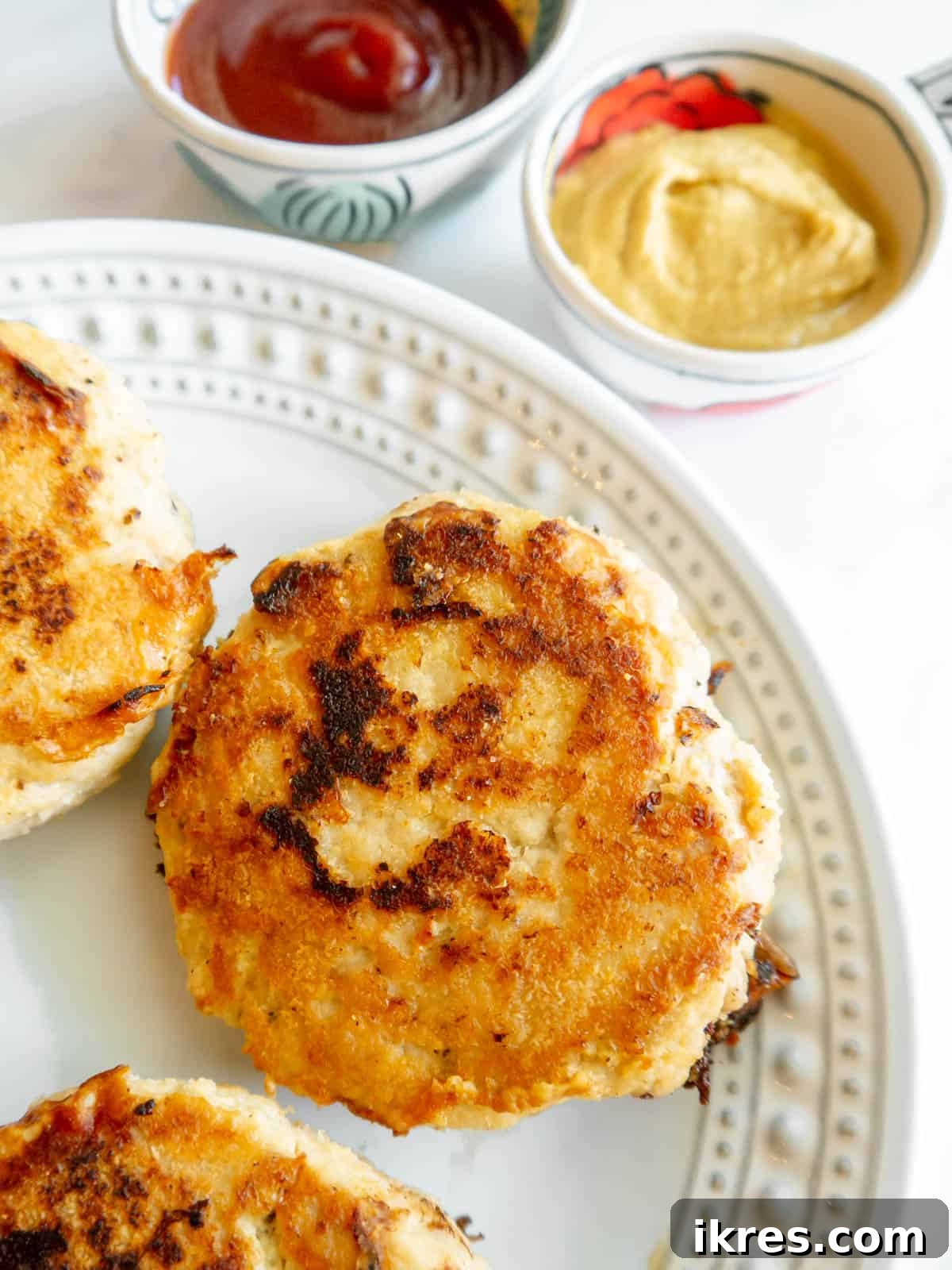 Healthy Chicken Burger Patty Recipe finished and ready to be served with garnishes.