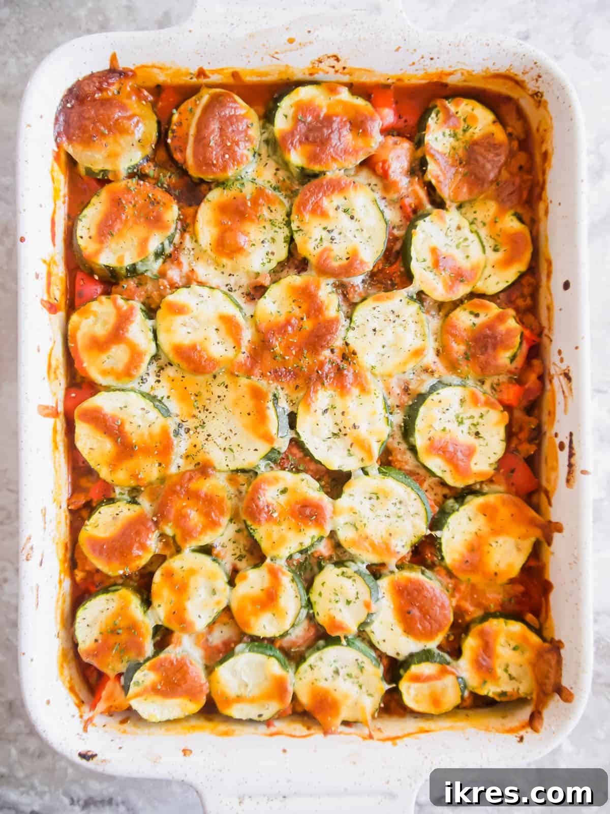 Hearty Turkey and Summer Vegetable Bake 9 A freshly baked turkey and eggplant casserole, golden brown with melted cheese bubbling on top.