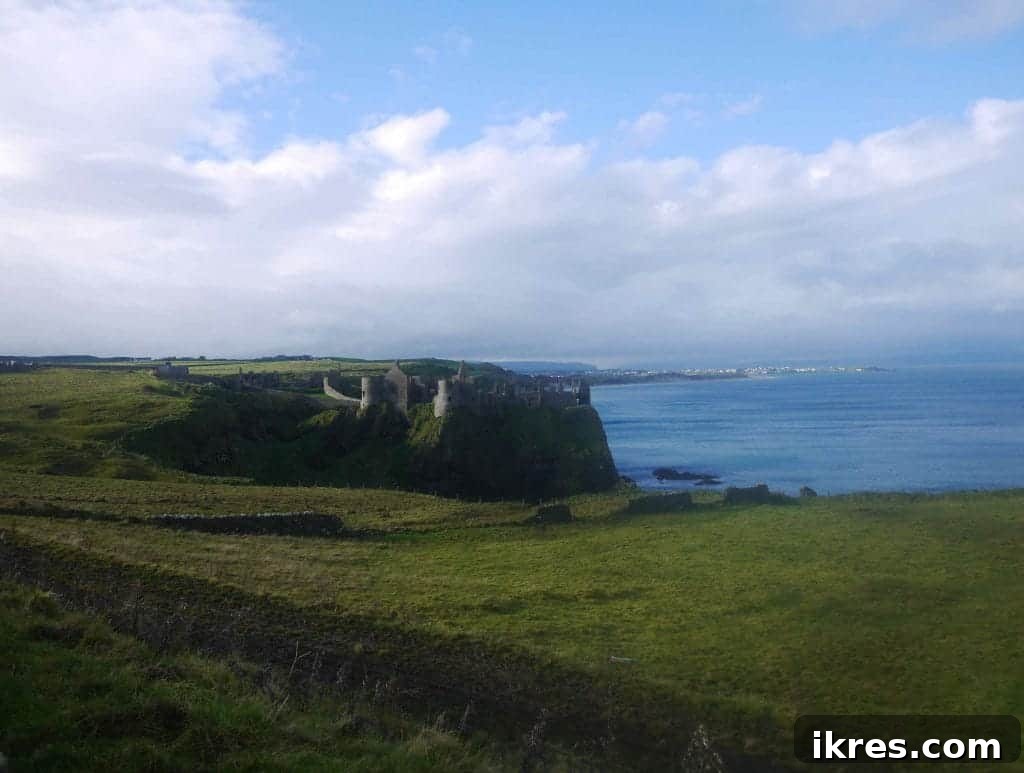 Discovering the breathtaking beauty of Northern Ireland's Antrim Coast, featuring rugged cliffs and pristine waters. Photo by Perchance to Cook.
