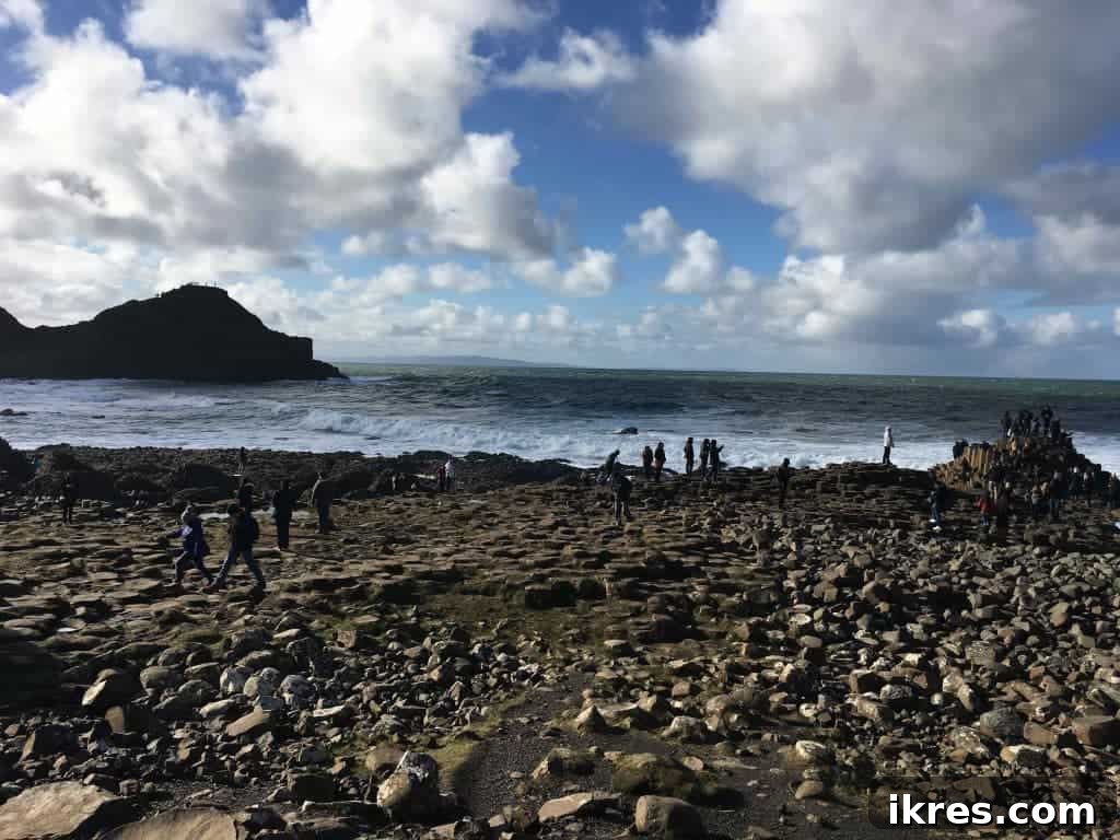 Visitors exploring the unique rock formations of the Giant's Causeway. Photo by Perchance to Cook.