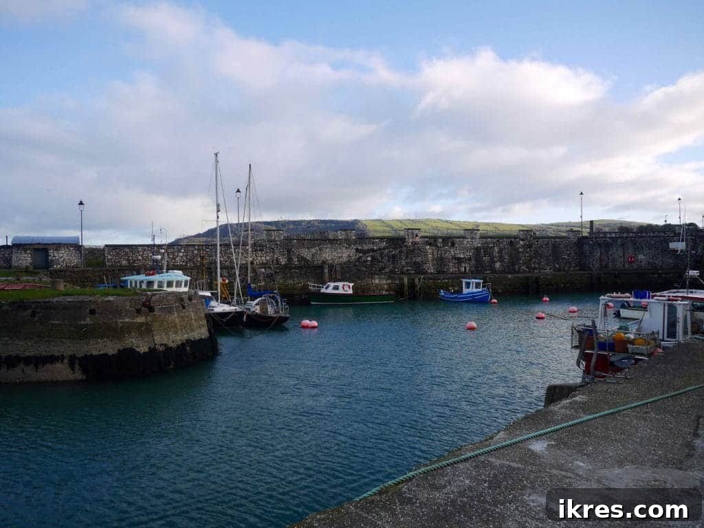 The charming coastal town of Carnlough in Northern Ireland, nestled by the sea. Photo by Perchance to Cook.