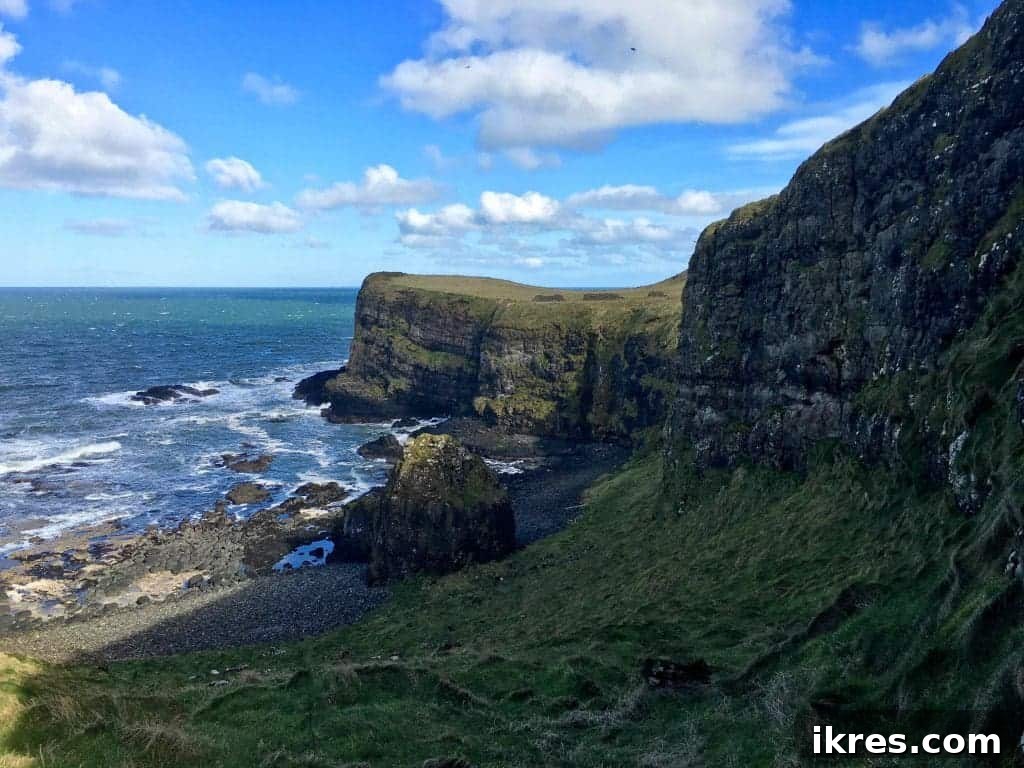 Stunning coastal landscape along the Antrim Coast, Northern Ireland. A must-see for nature lovers. Photo by Perchance to Cook.