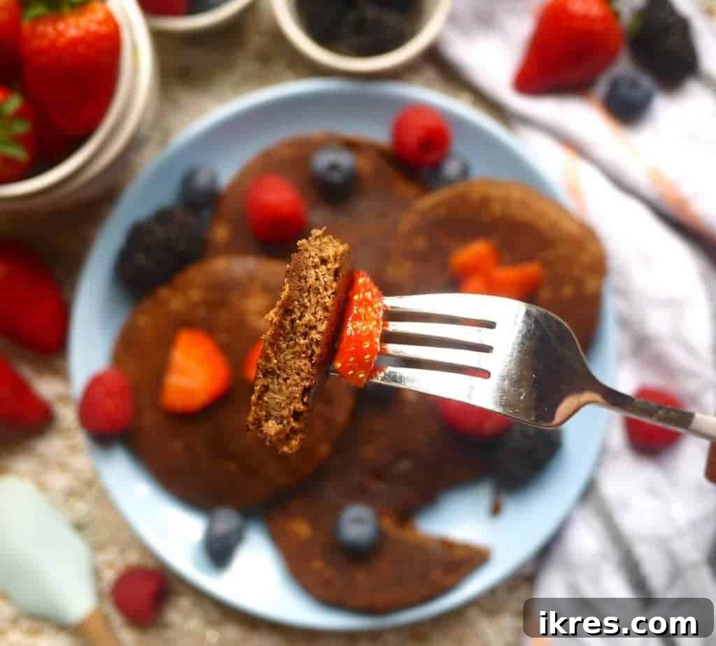 The rich chocolate flavor in these Chocolatey Cocoa Paleo Pancakes (GF) comes from wholesome cocoa powder. | Perchance to Cook, www.perchancetocook.com