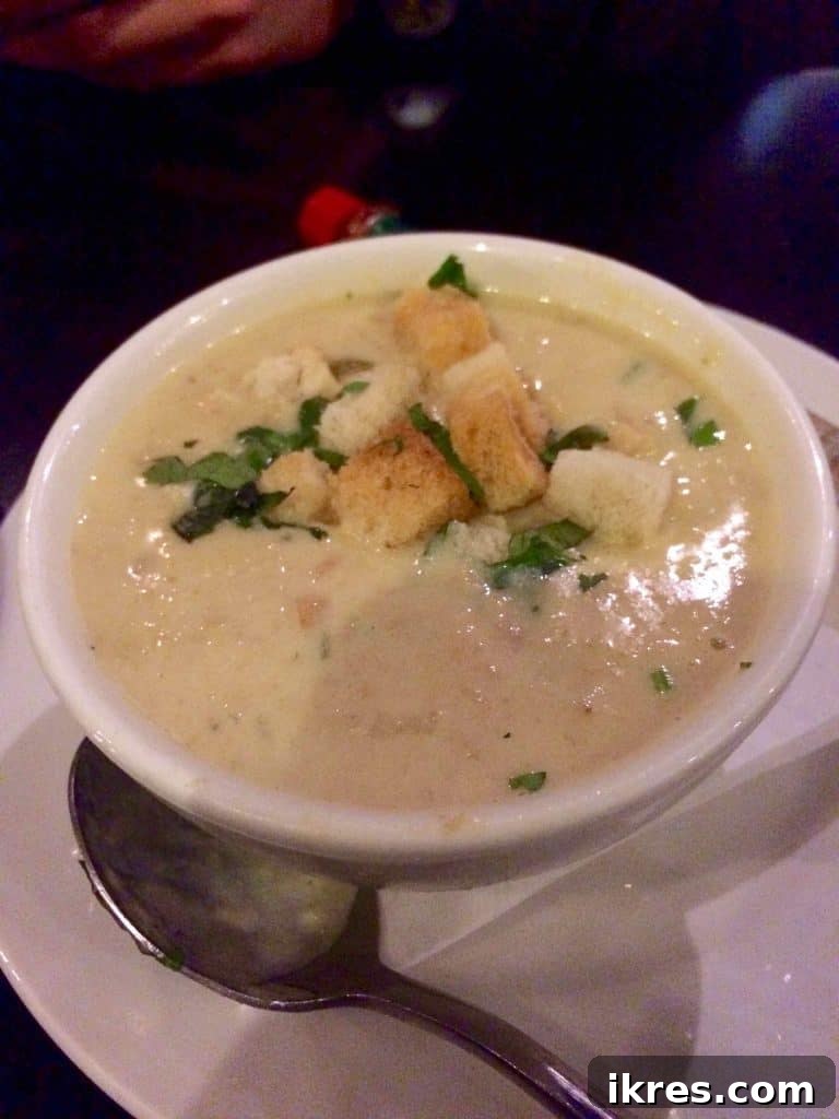 A close-up of creamy orzo with seafood, a popular dish at Mourne Seafood Bar.