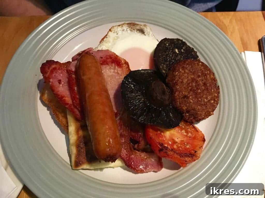 A hearty Full Irish Breakfast served with eggs, bacon, sausage, black pudding, and more.