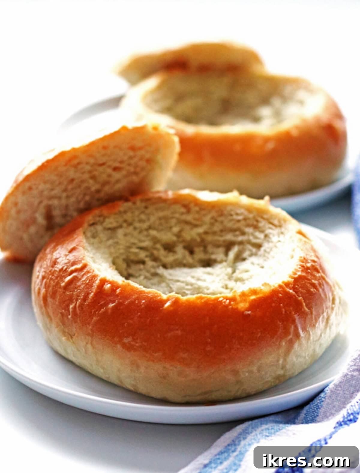 Homemade Bread Bowls filled with chili, ready to be enjoyed.