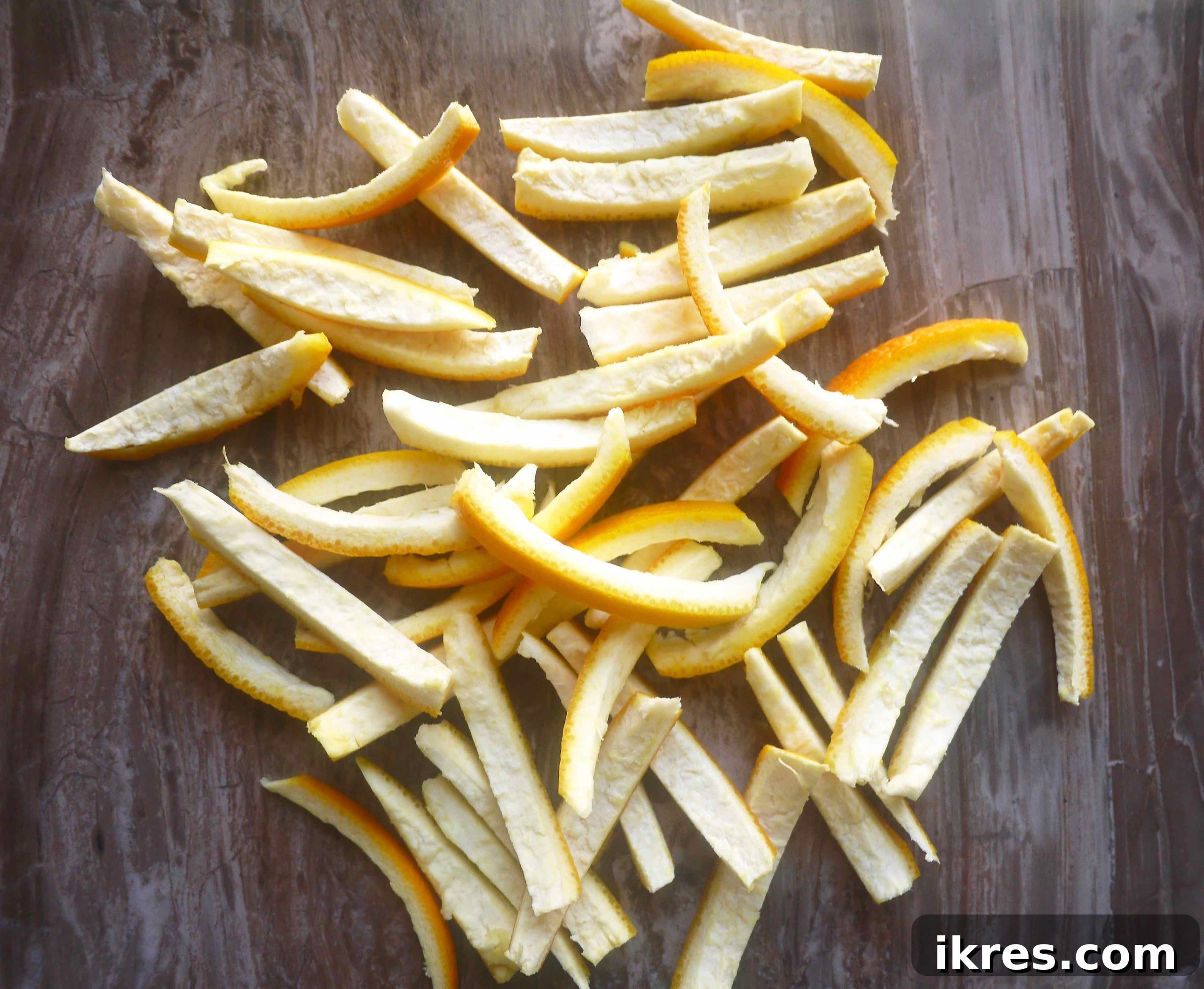 Paleo Honey Candied Orange Peels 5 Strips of orange peels cut up.