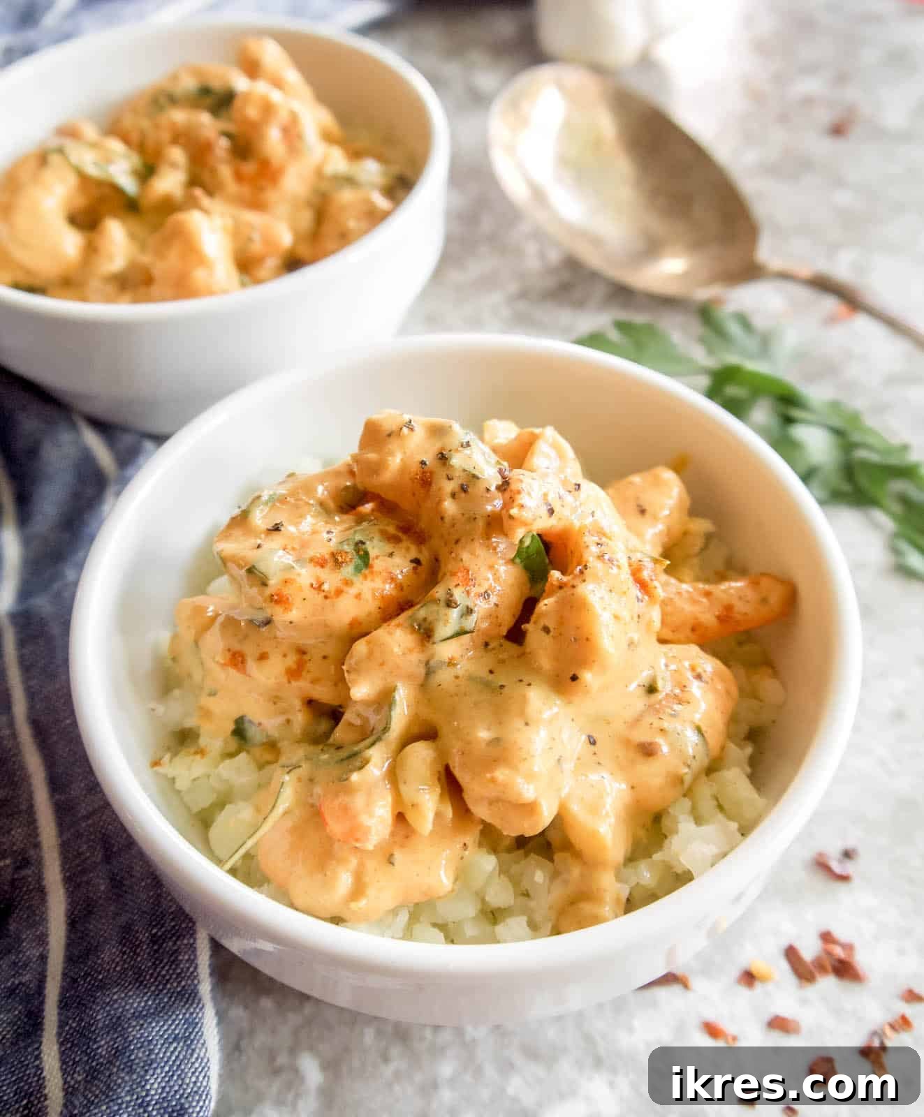 Perfect Paleo Paprika Garlic Shrimp Dinner 3 Paleo shrimp recipe in a ceramic bowl, garnished with fresh herbs, ready to be served.