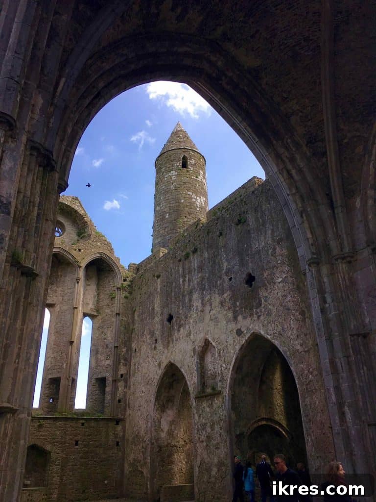Southeast Ireland's Treasures: Kilkenny, Cashel, Durrow, and Wedding Memories 26 Interior view of a chapel within the Rock of Cashel, showcasing ancient stonework
