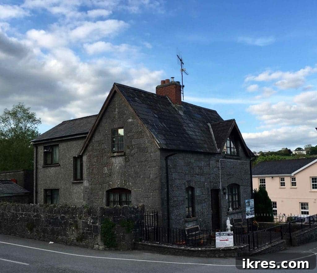 Southeast Ireland's Treasures: Kilkenny, Cashel, Durrow, and Wedding Memories 29 Quaint shops and traditional Irish pubs lining a street in Cashel