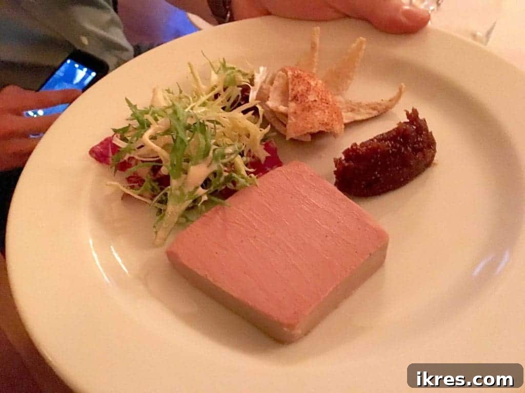 Southeast Ireland's Treasures: Kilkenny, Cashel, Durrow, and Wedding Memories 52 Close-up of a gourmet foie gras appetizer with fig chutney
