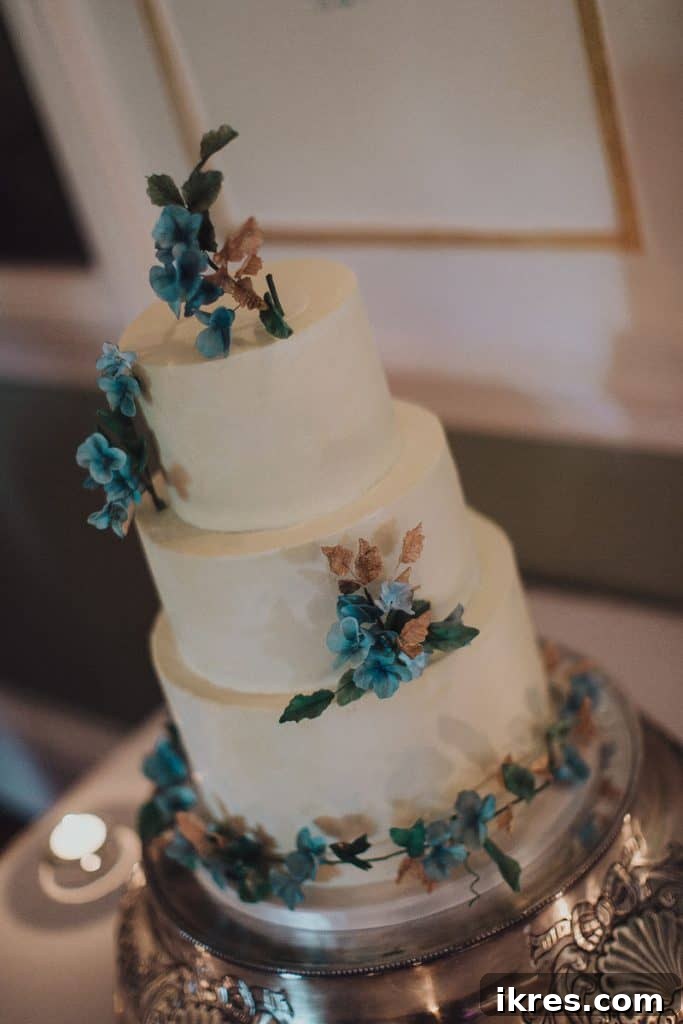 Southeast Ireland's Treasures: Kilkenny, Cashel, Durrow, and Wedding Memories 53 Elegant wedding cake with floral decorations at Castle Durrow