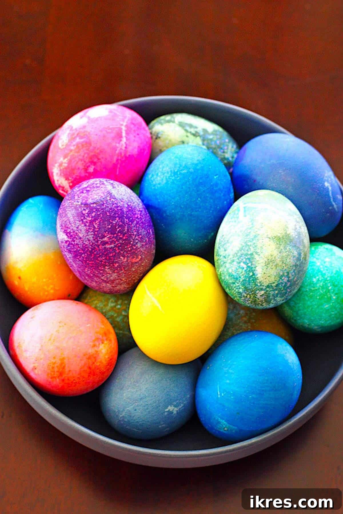 Quick Creamy Egg Salad 3 Colored Hard-Boiled Easter Eggs in a bowl for making Easy Egg Salad.