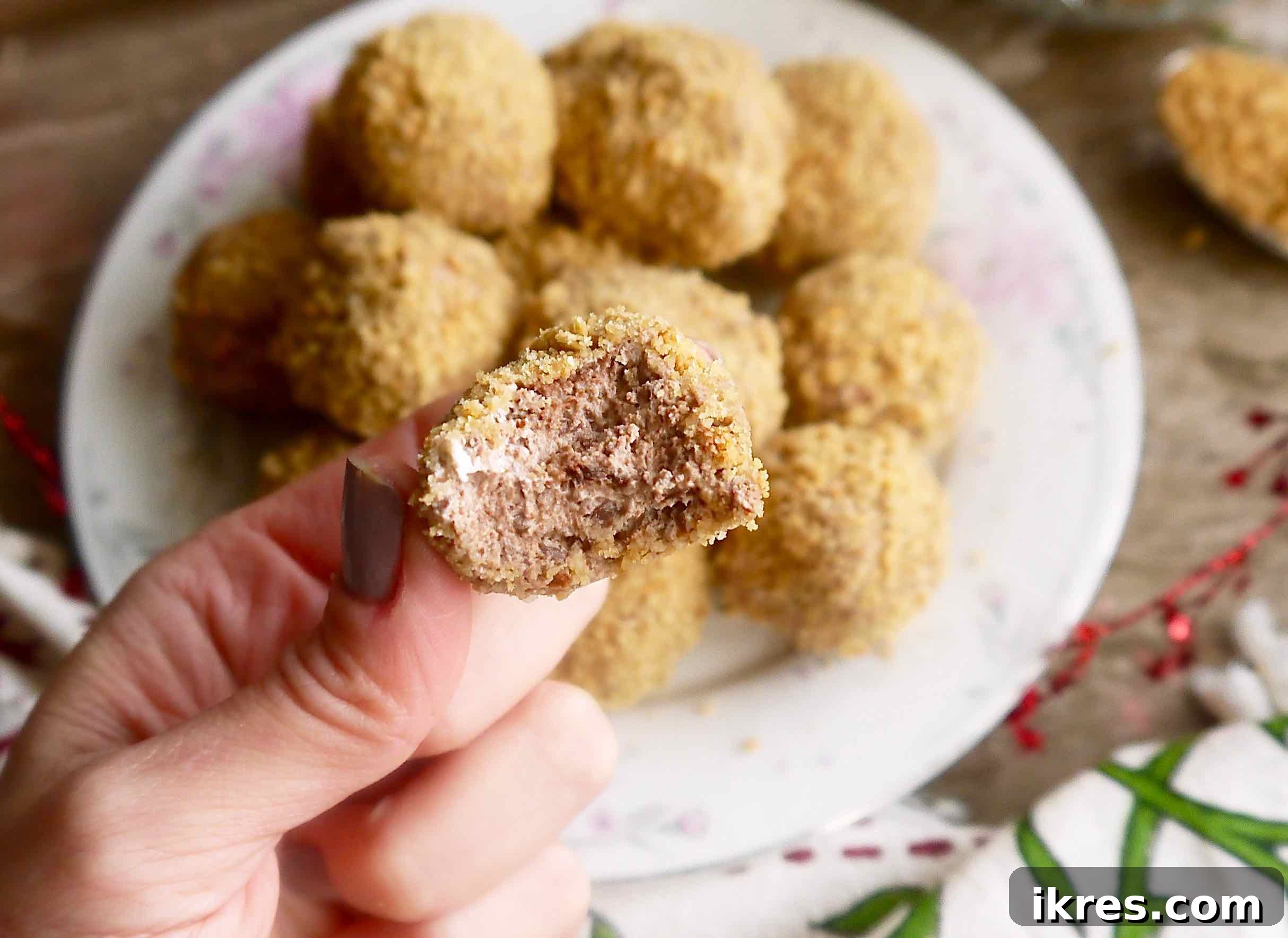 A delightful bite-sized Paleo chocolate mousse truffle, freshly made and ready to enjoy.