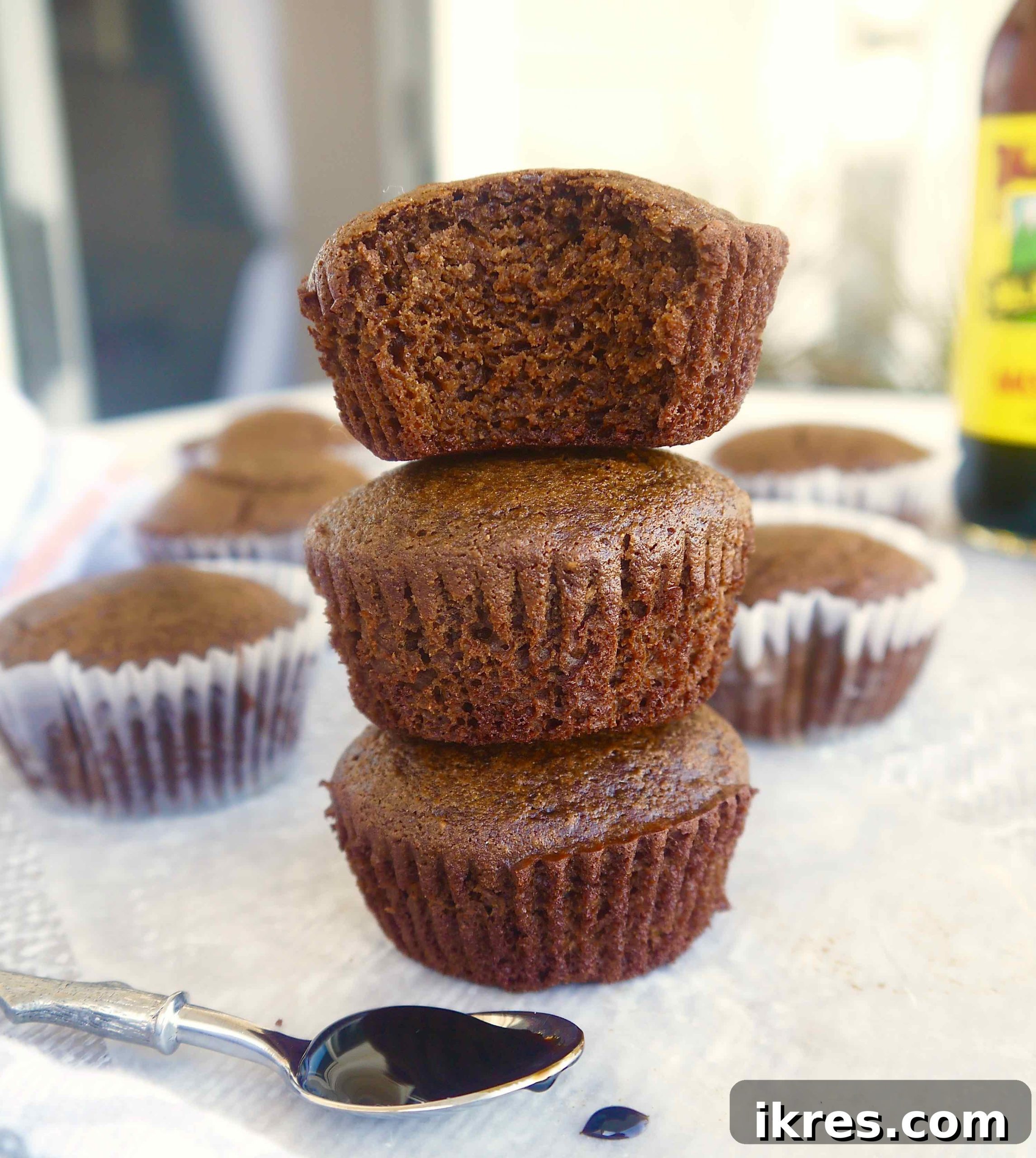 The process of making chestnut flour gingerbread muffins, showing the wet ingredients being combined into a smooth mixture.