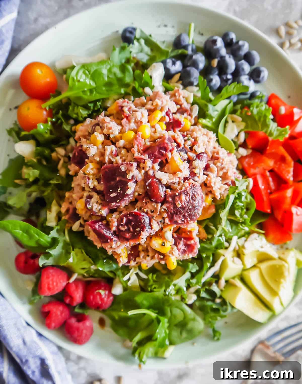 Vibrant Quinoa Beet Salad with Tuna 2 Vibrant Quinoa Beet Salad with Tuna served on a plate, ready to enjoy.