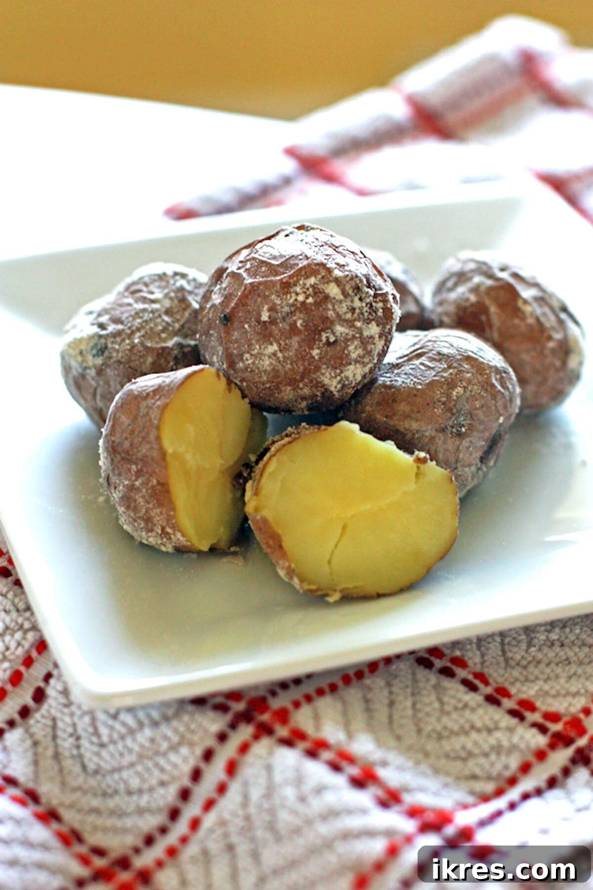 A close-up of beautifully cooked Salted Potatoes, showcasing their texture.