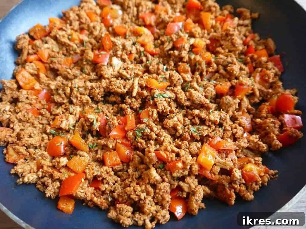 Zesty Turkey Taco Zoodle Bowls 5 The ground turkey taco meat, perfectly browned and cooked, resting in the frying pan.