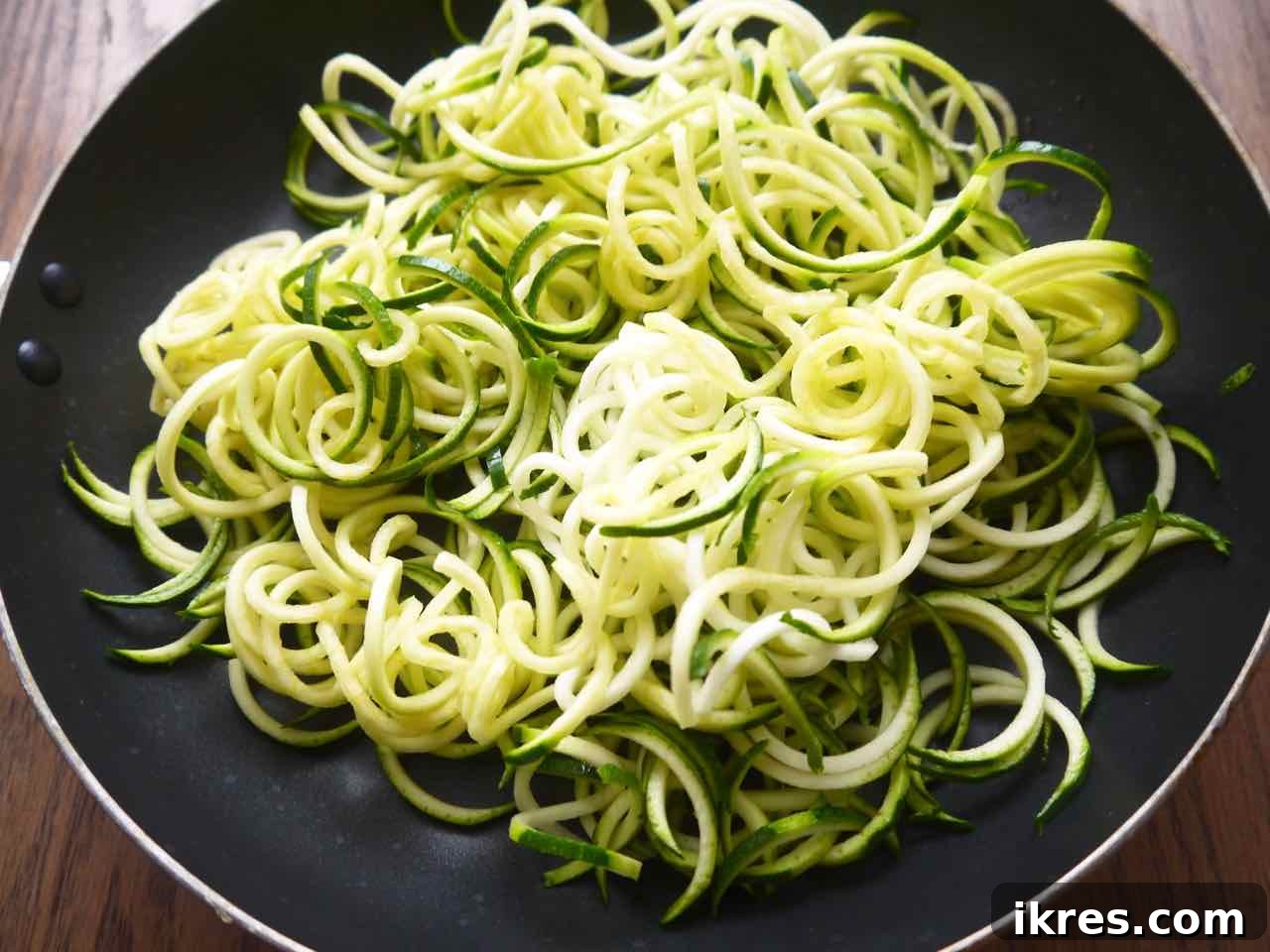 Zesty Turkey Taco Zoodle Bowls 6 Freshly spiralized zucchini noodles, raw and ready for cooking in a pan.