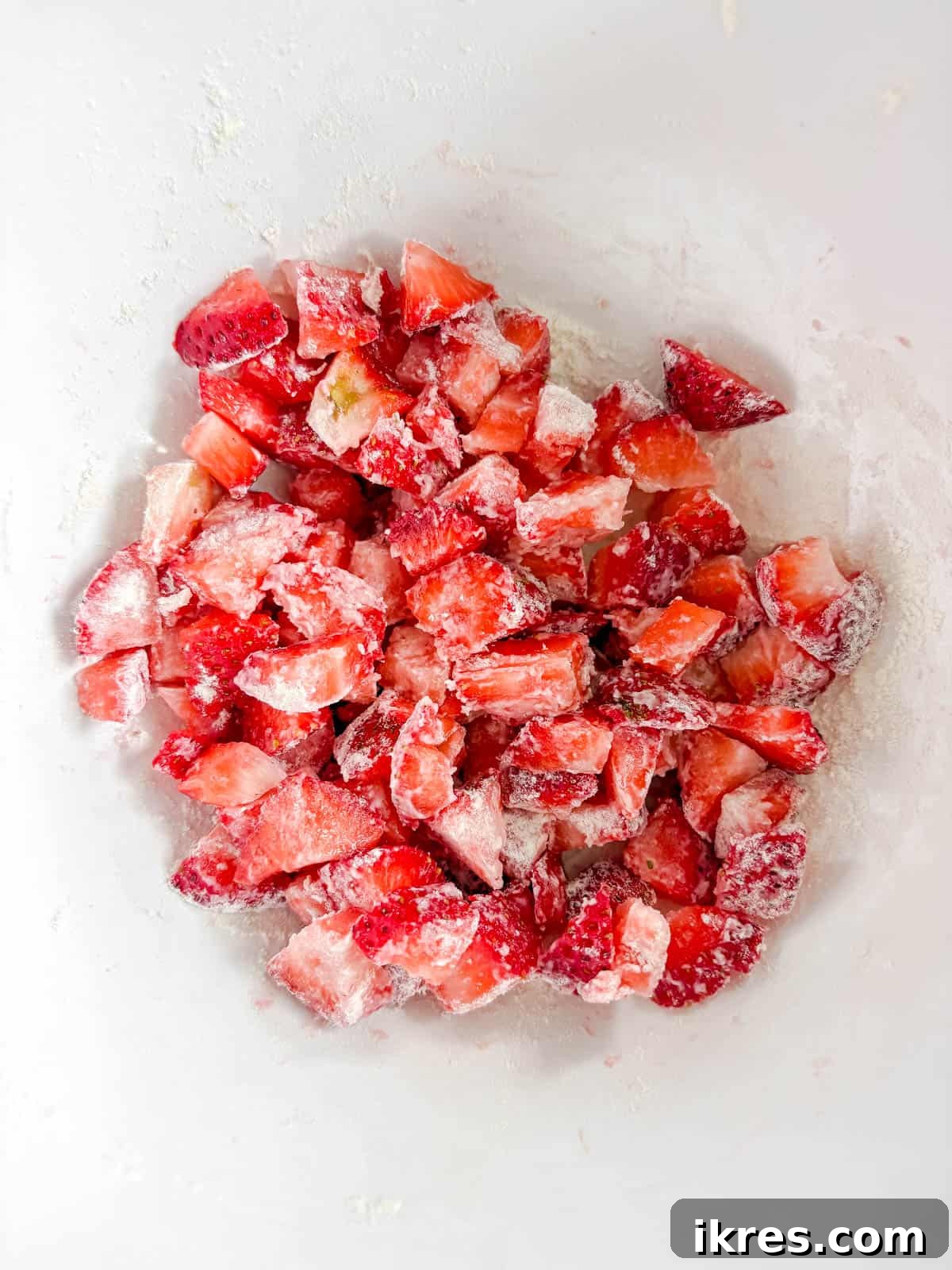 Strawberry Swirl Banana Bread 7 Chopped fresh strawberries lightly coated with a tablespoon of flour in a small bowl.