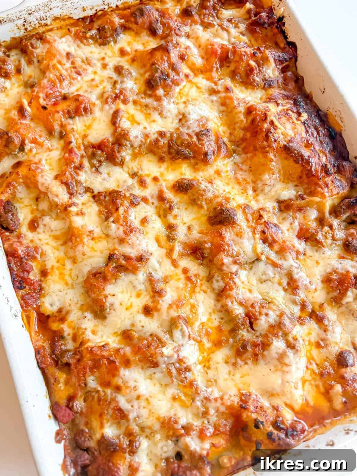 Effortless Greek Yogurt Lasagna 15 A full 9x13 pan of freshly baked no-boil lasagna with a golden-brown cheesy top.