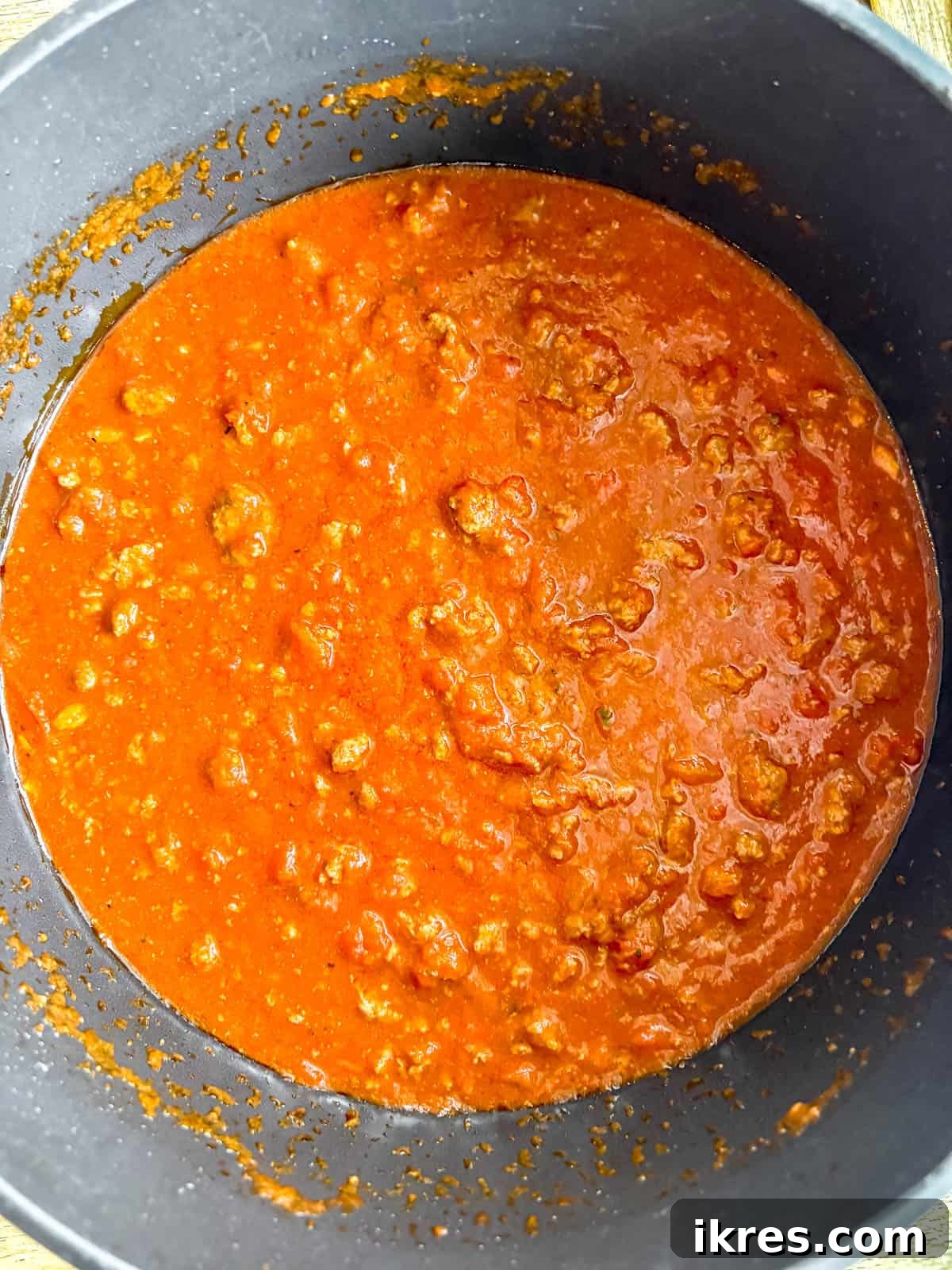 Effortless Greek Yogurt Lasagna 5 Marinara sauce simmering with the cooked ground beef to create the lasagna sauce.