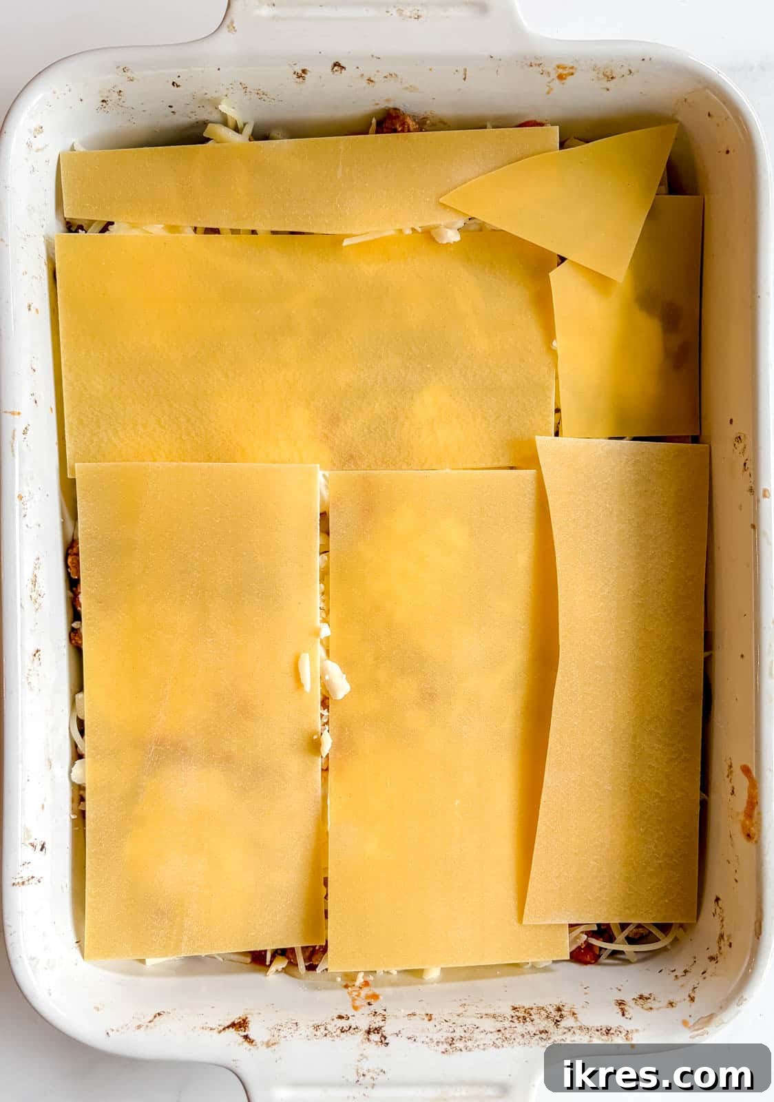 Effortless Greek Yogurt Lasagna 10 Another layer of no-boil noodles is added to the lasagna.