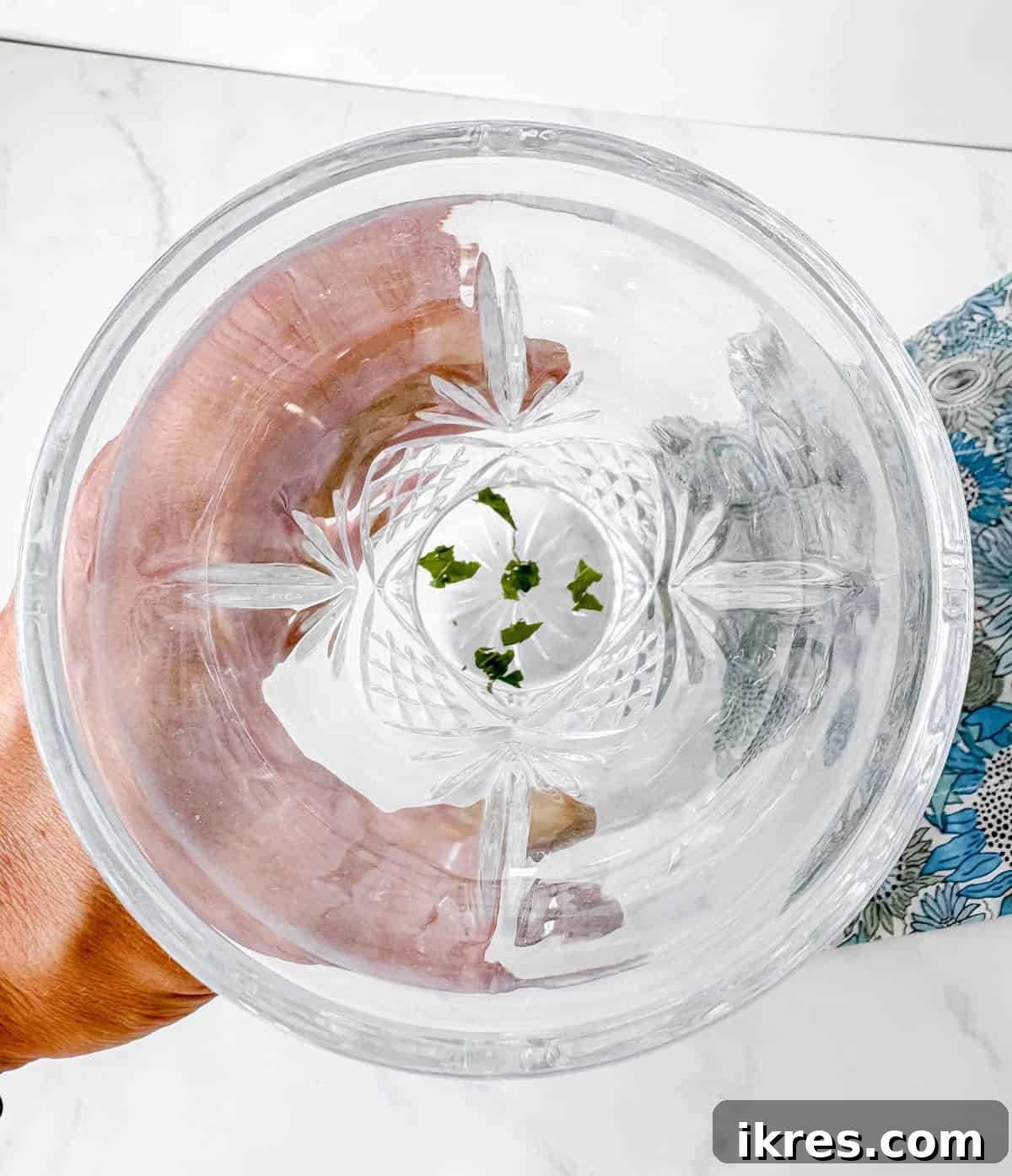 Mint muddled in an alcohol shaker. 