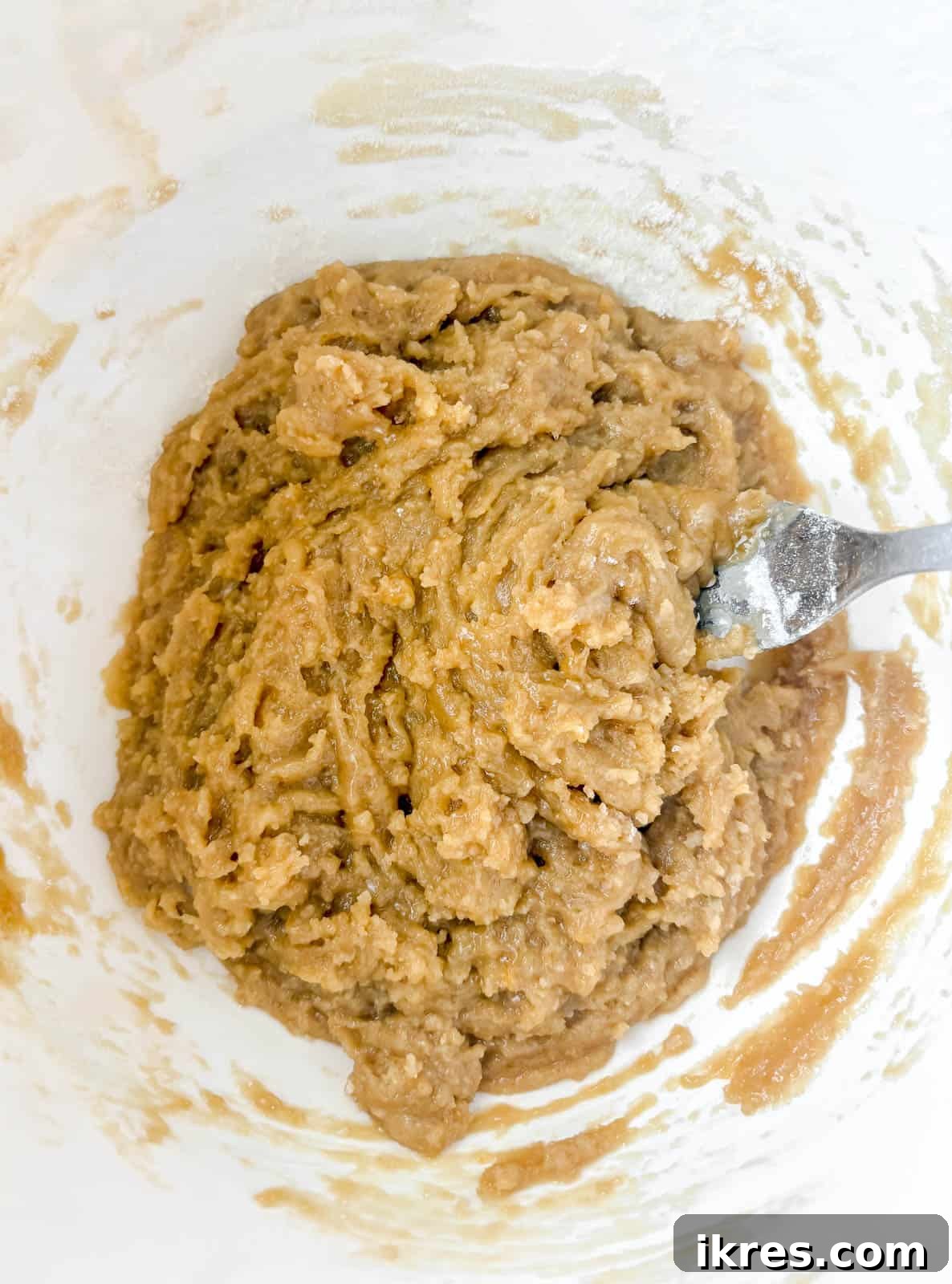 Small Batch Chocolate Chip Cookie Recipe (Makes 12) 6 Cookie dough for small batch chocolate chip cookies in a bowl.