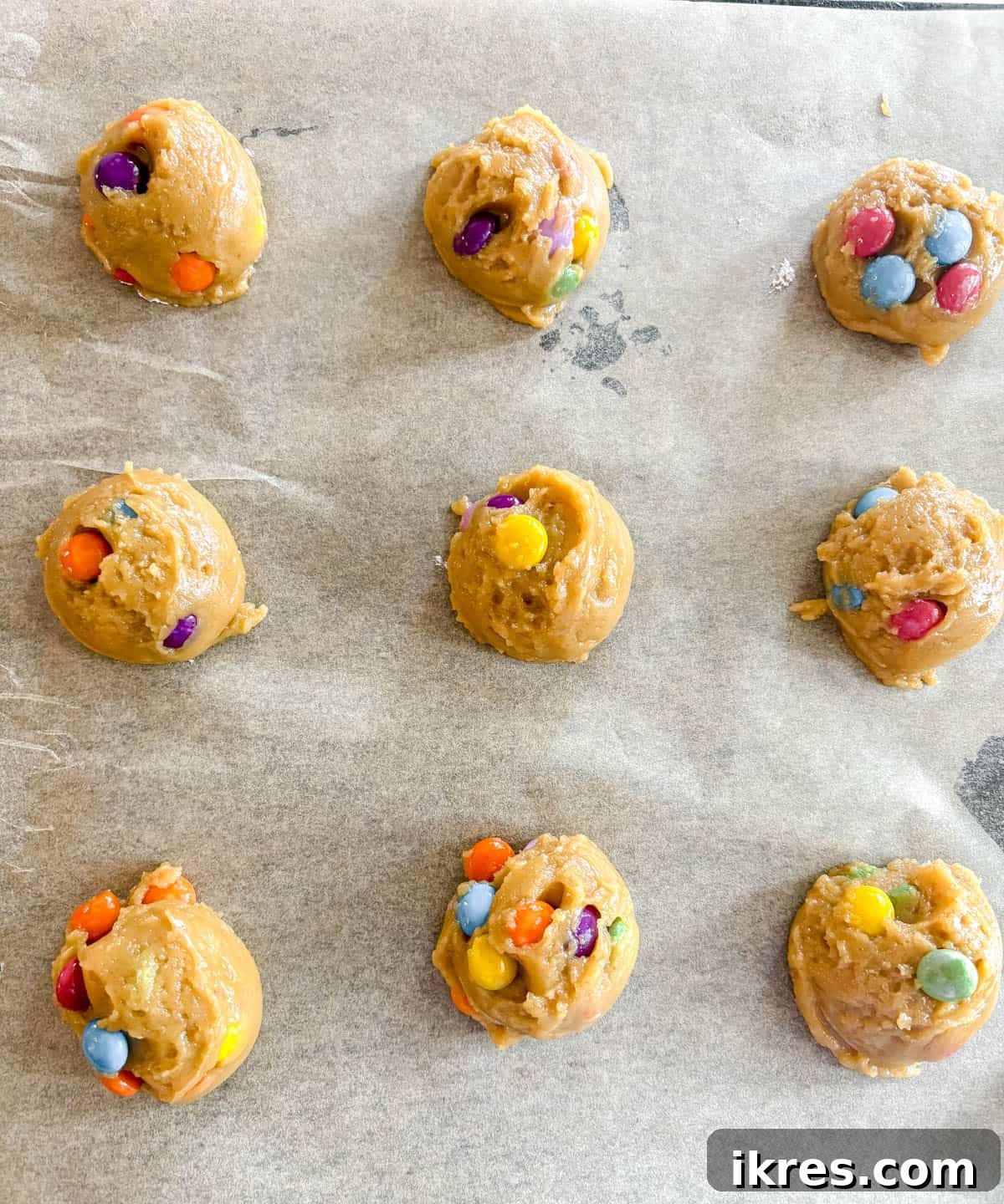 Small Batch Chocolate Chip Cookie Recipe (Makes 12) 8 Chocolate chip cookies on a pan before baking.