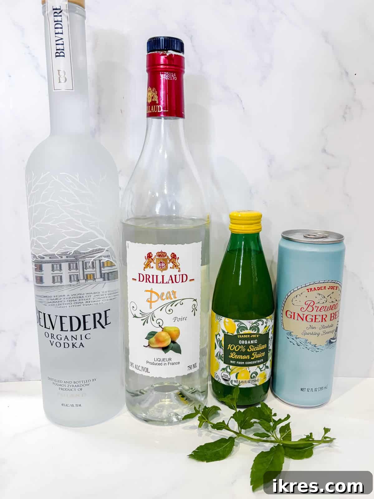 Pear Vodka Moscow Mule: Refreshing Pear Cocktail 3 Ingredients needed to make a pear moscow mule.