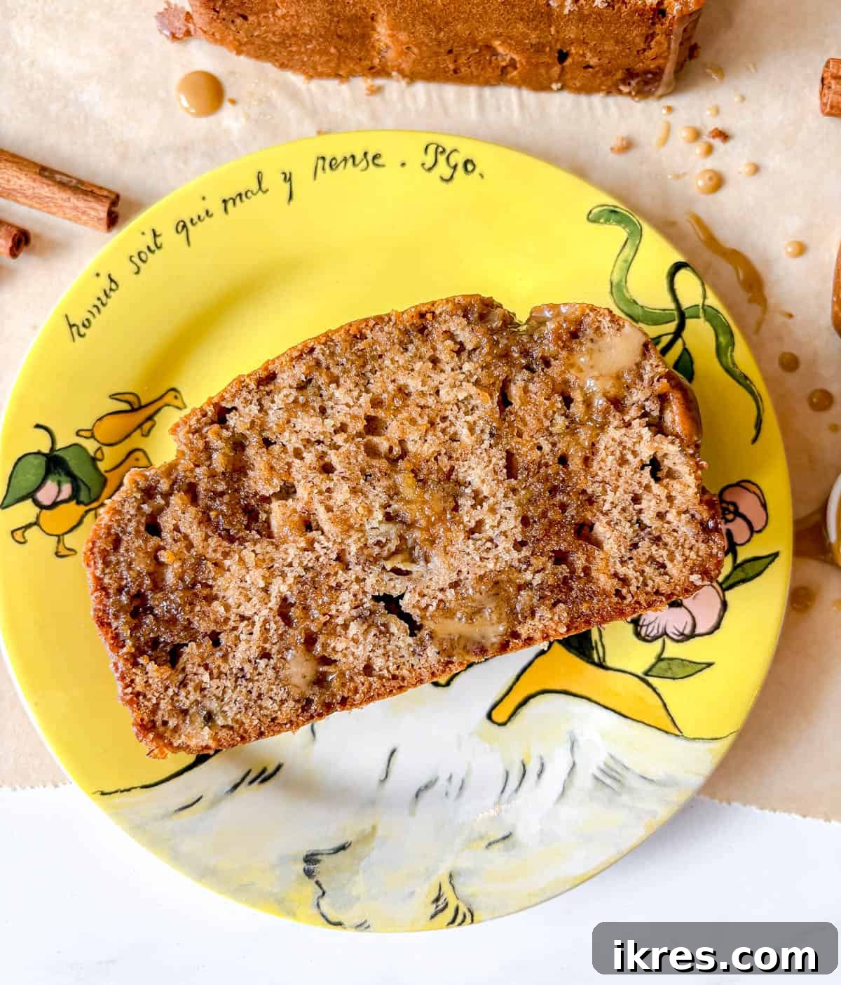 Slice of maple banana bread on a plate.