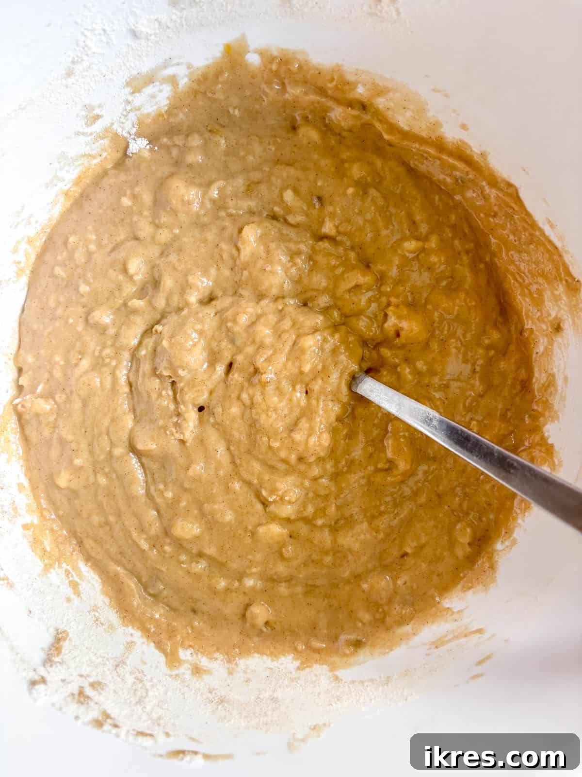 Maple banana bread batter in a bowl.