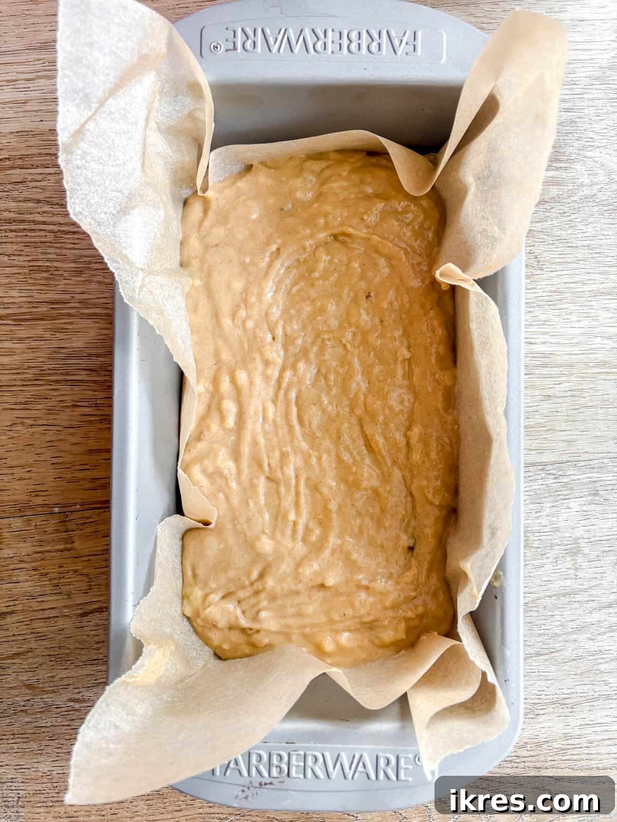 Maple banana bread in a pan before baking.