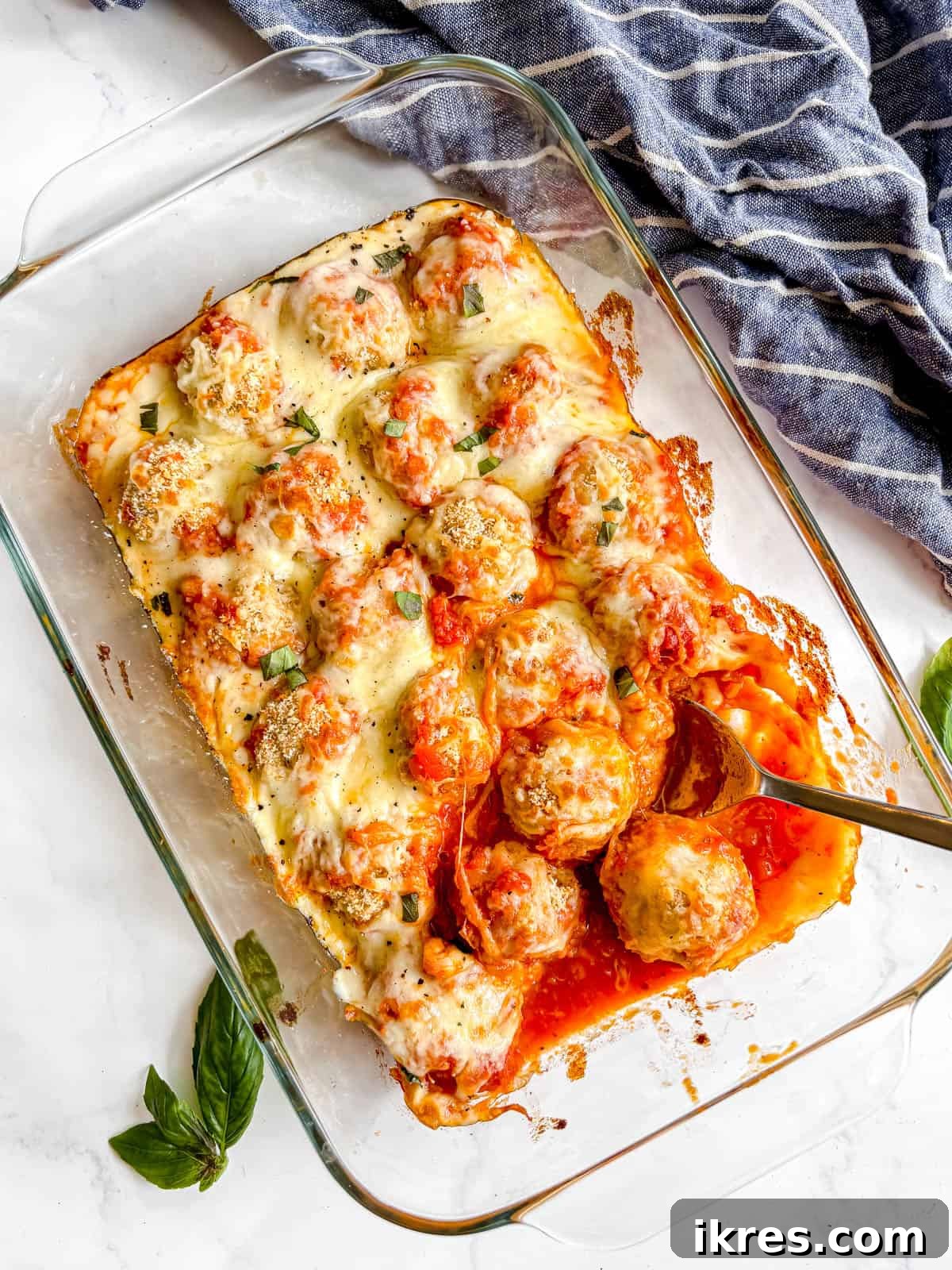 Chicken parmesan meatballs in a dish ready to be served.