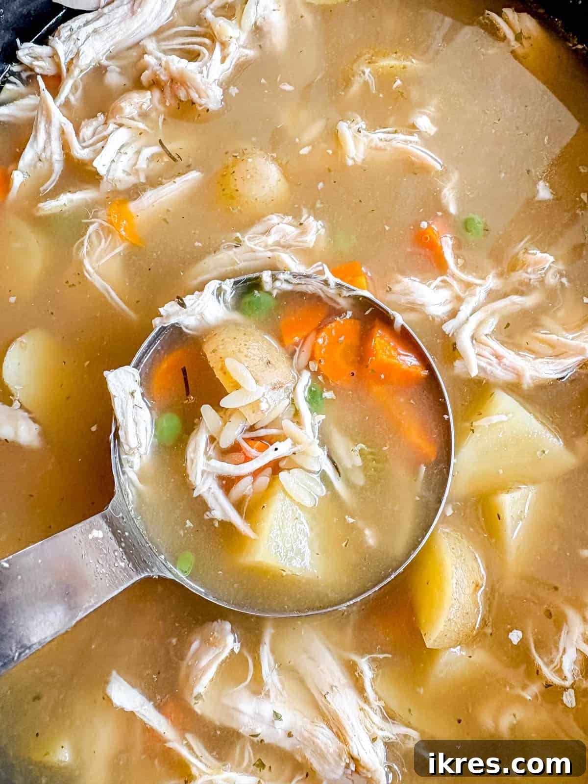 Chicken Soup with Potatoes and Orzo in a crockpot after cooking.