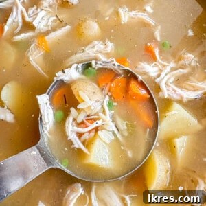 Chicken Soup with Potatoes and Orzo in a crockpot after cooking.
