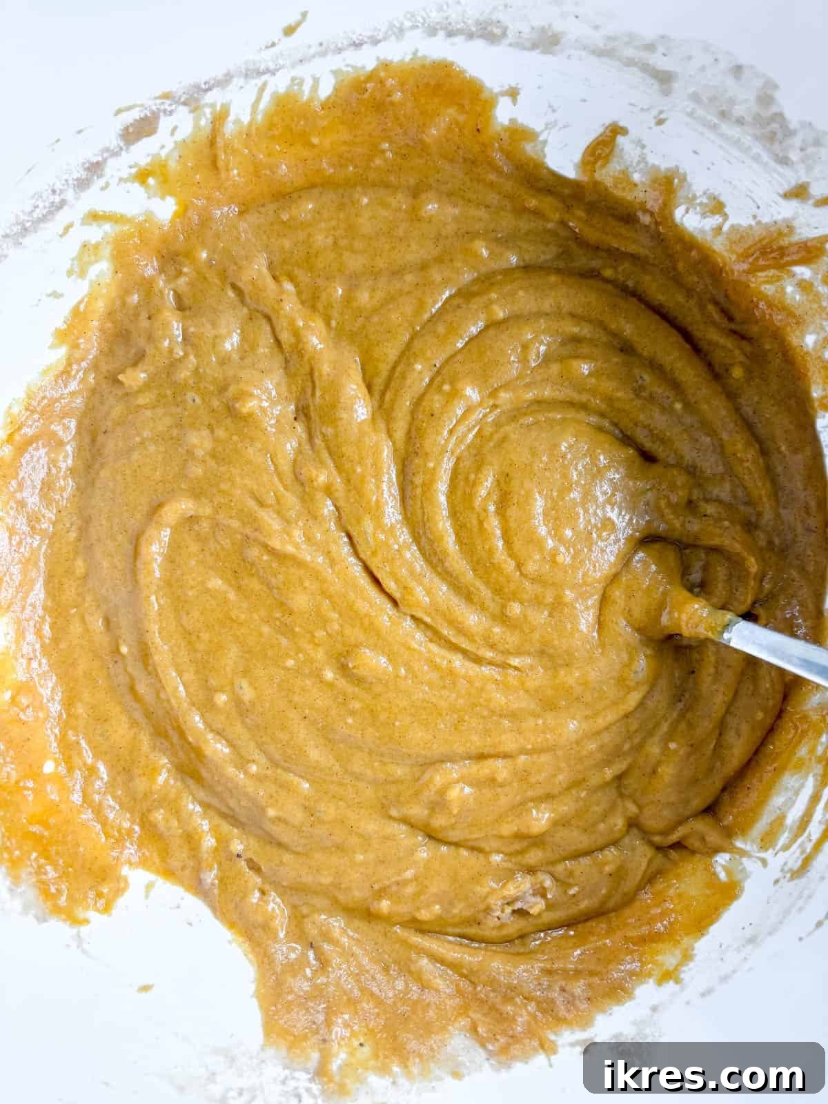 Pumpkin Cranberry Muffins Recipe: Spiced, Moist Fall Treats 6 Pumpkin batter in a bowl.